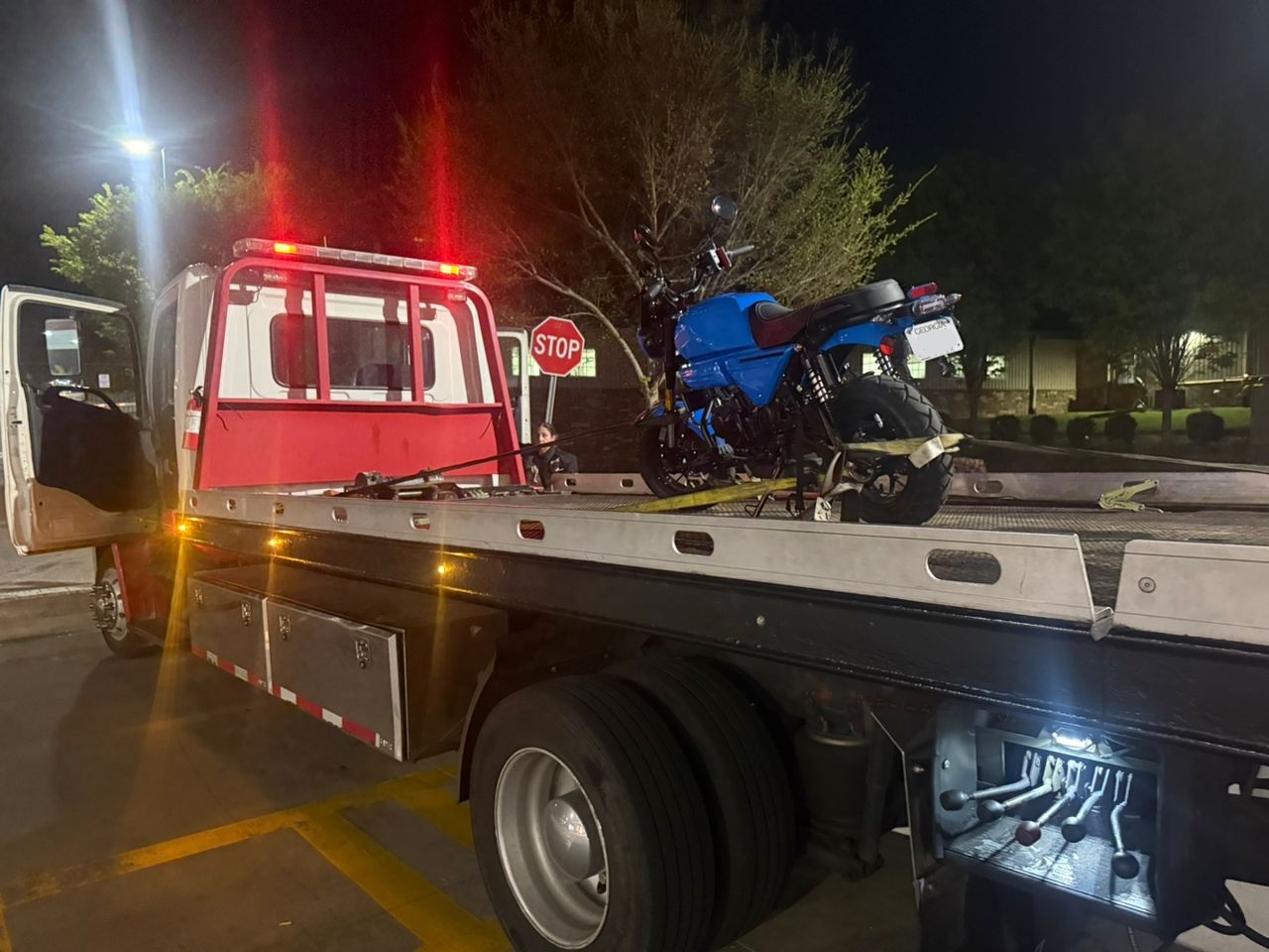 Motorcycle towing truck on Jimmy Carter Blvd